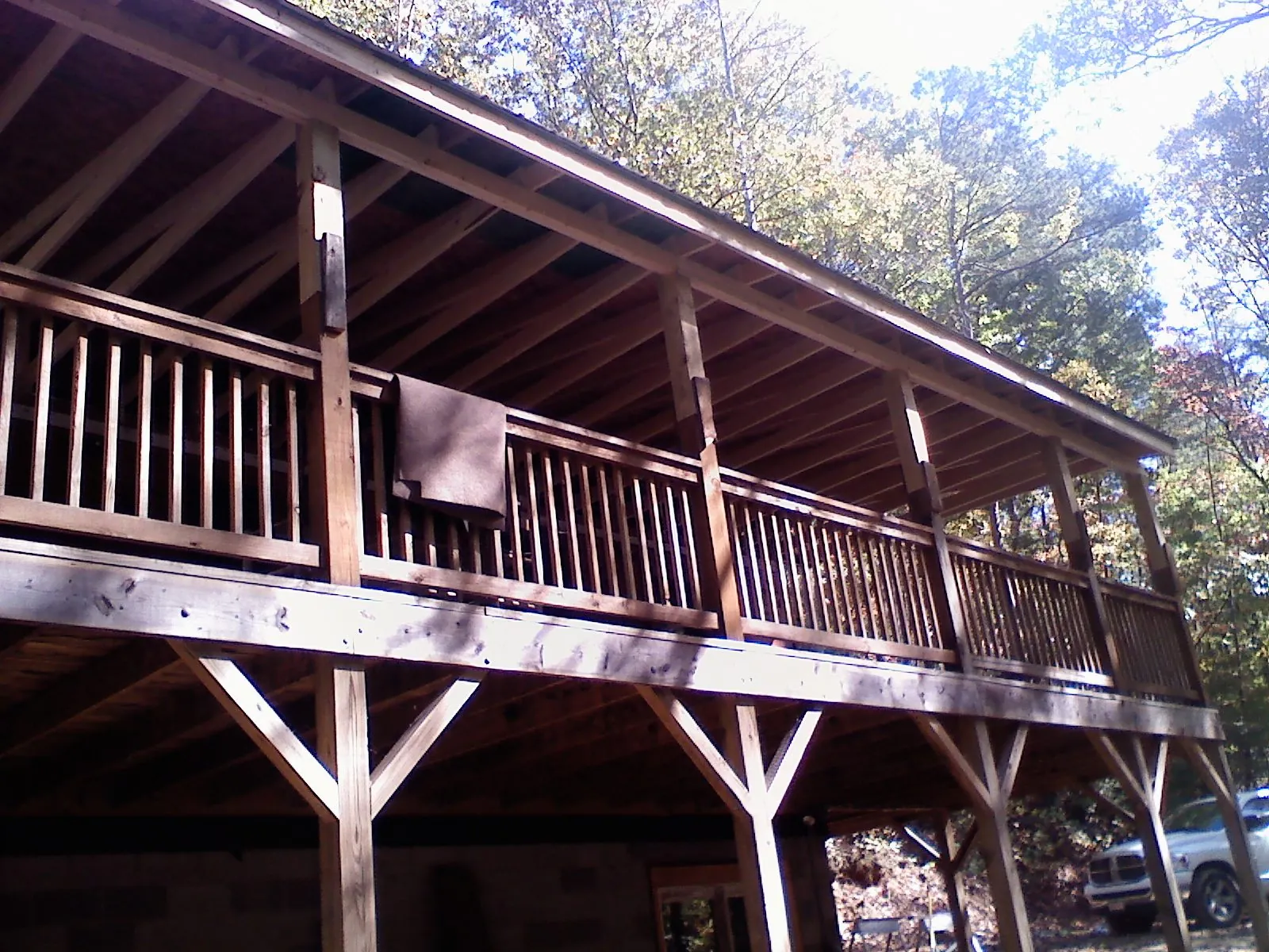 Timber framing under a new elevated porch and deck — Roof Leak Repair in Enid by Roofing Brothers